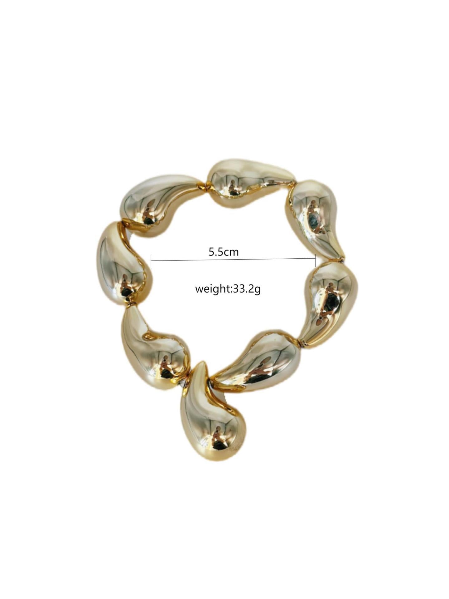 Pulsera Asimétrica de Cobre con Diseño de Globo y Motivo de Gotas de Agua en Forma de Rombos