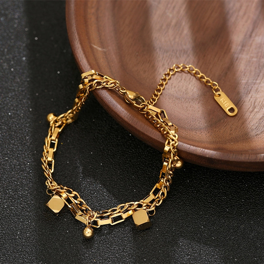 Brazalete de Acero Titanio de Color Sólido Chapado en Oro - Ideal para el Uso Diario