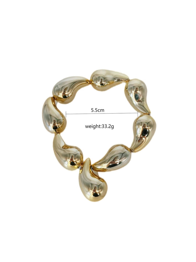 Pulsera Asimétrica de Cobre con Diseño de Globo y Motivo de Gotas de Agua en Forma de Rombos