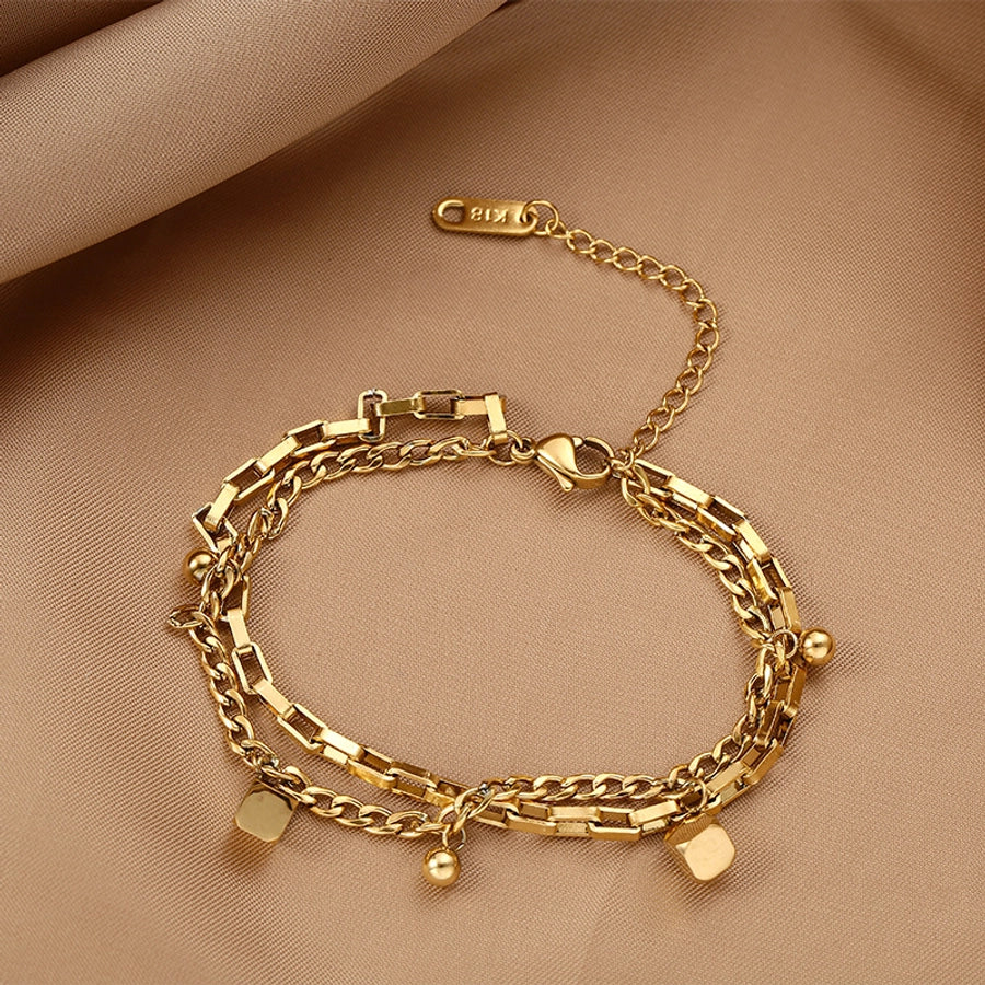 Brazalete de Acero Titanio de Color Sólido Chapado en Oro - Ideal para el Uso Diario