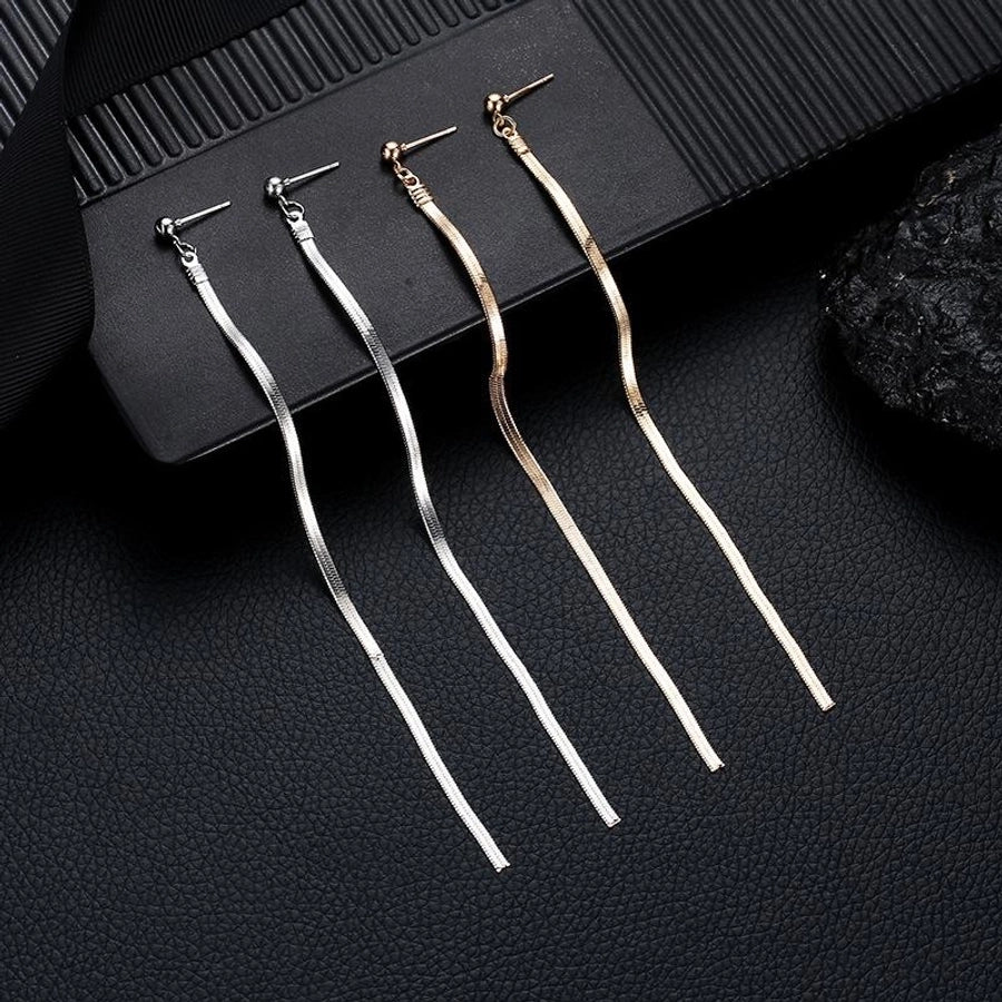 Aretes de Borla con Cadena Larga - Elegancia y Estilo Moderno
